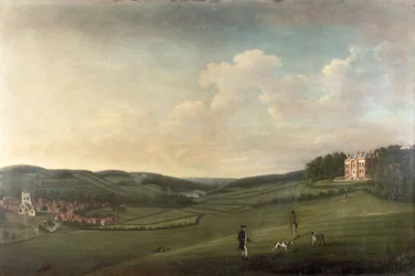Landhuis op een heuvel met uitzicht op een dorp